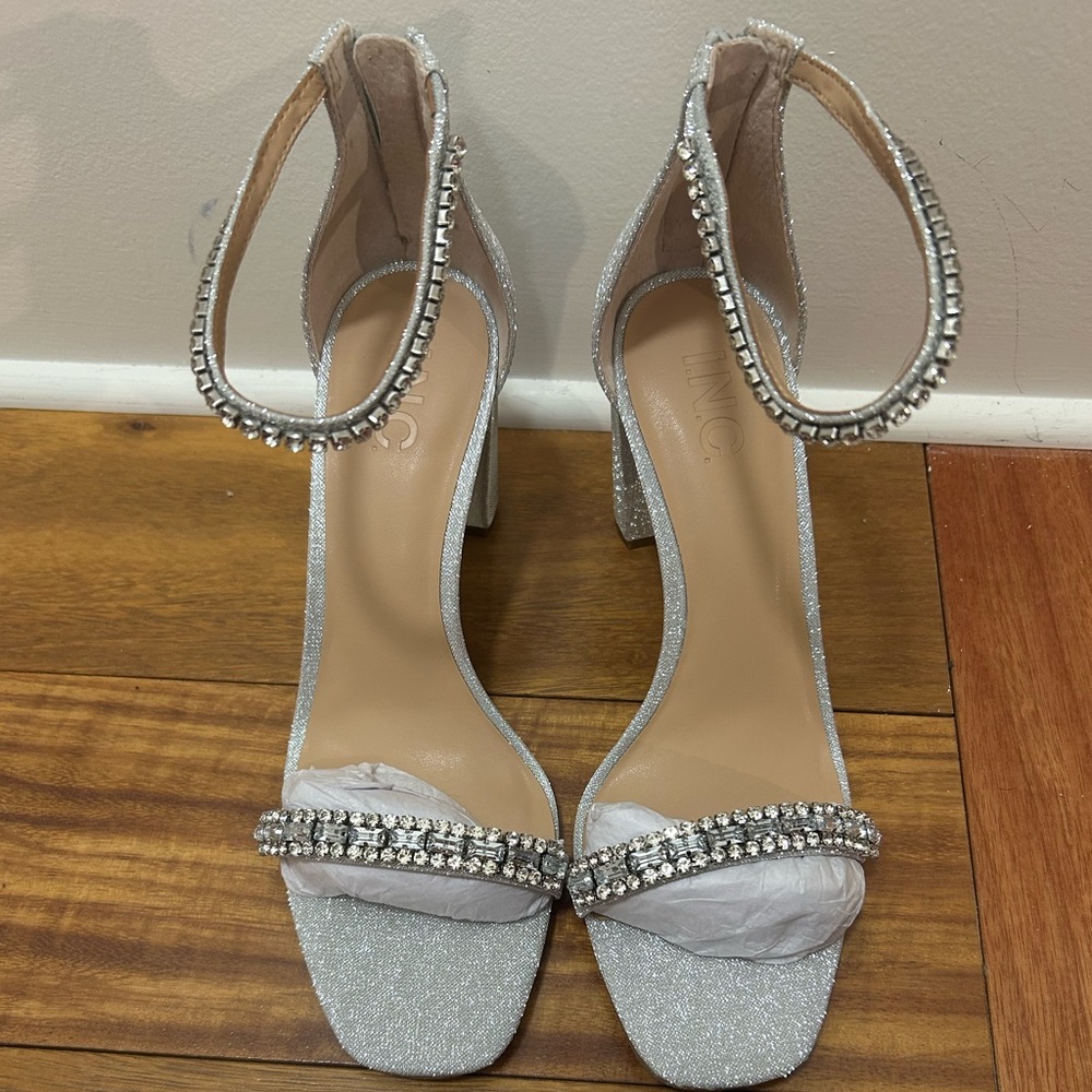 brand new with original packaging INC silver glitter heels